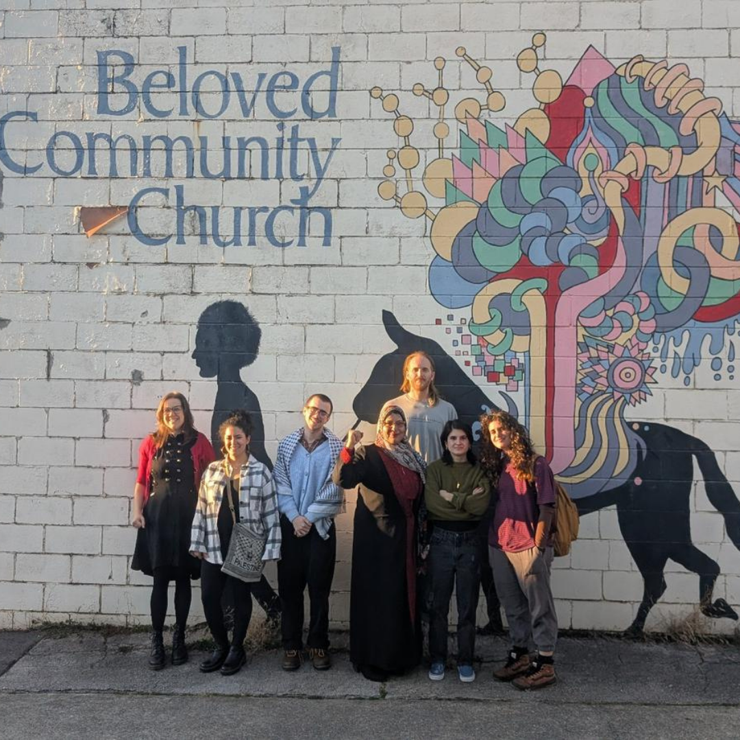 Members of Birmingham DSA's Queer Socialists Section pose for a picture with artists who presented works at QueerSoc's Pinkwashing Awareness teach-in.